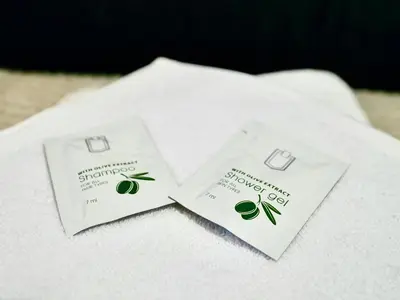 two white towels with green leaves on them at Lily's Studio 1 by Bulgarentals - Central Sofia in Sofia