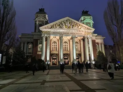 a large building with people walking in front of it at Lily's Studio 5 by Bulgarentals - Central Sofia in Sofia