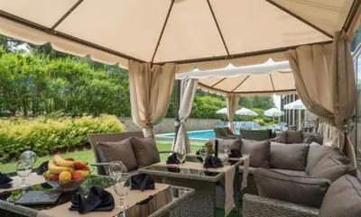a patio with a table with fruit on it at Apartament by Zenit in Terra Complex B30 in Razlog