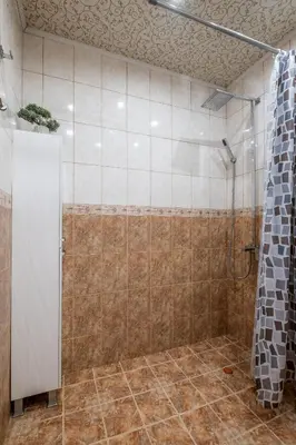 a bathroom with a shower with a shower curtain at Deja vu, Cozy & Quiet 1 BDR Apt Fast Wi-Fi in Sofia