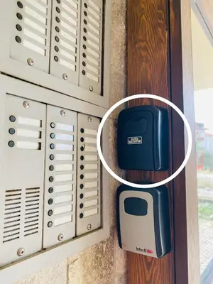a door with a cell phone inside of it at Studio El - All seasons in Bansko