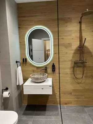 a bathroom with a sink and a mirror at Sana Ski apartment 313A in Flora, Borovets in Borovets