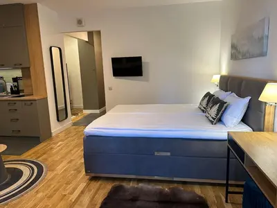 a bedroom with a large bed in a room at Sana Ski apartment 313A in Flora, Borovets in Borovets