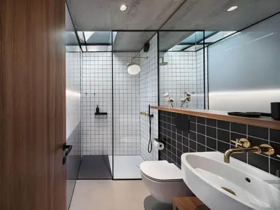 a bathroom with a toilet and a sink and a shower at DOT Sofia in Sofia