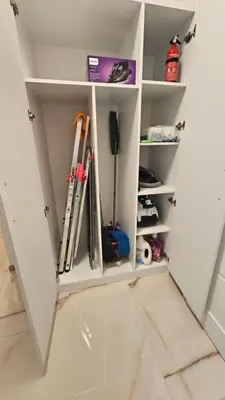 a white closet with a bunch of skis at Tsar Asen 21 in Sofia