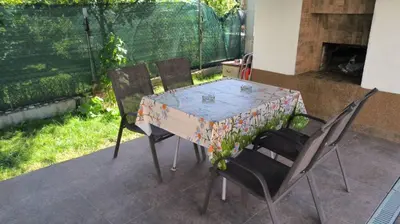 a table and chairs on a patio at Tea House Samokov in Samokov