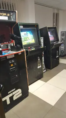 three video game consoles are lined up in a room at VIP Apartments Belvedere with terrace K105 in Bansko