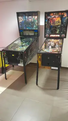 two video game machines sitting next to each other at VIP Apartments Belvedere with terrace K105 in Bansko