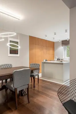 a kitchen and dining room with a table and chairs at NEW High-End Designer 3BR Central Apt Free Parking in Sofia