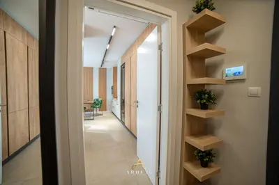a hallway with a door leading into a room at ARHEYA 3 apart АРХЕЯ 3 апартамент за гости in Karlovo