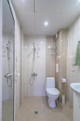 a bathroom with a shower and a toilet and a sink at Cozy & Delightful Apart & AUBG & Free Garage Parking in Blagoevgrad