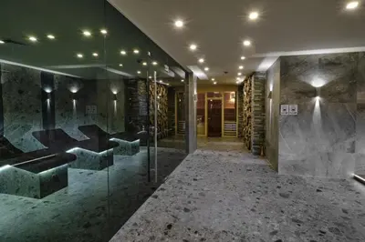 a room with a hallway with a glass wall at Private 1bedroom apt in SPA Resort - SPA included in Bansko