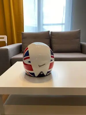 a helmet sitting on top of a table at Boutique Magenta Pearl Apartment with free WiFi in Sofia