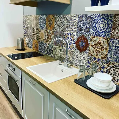 a kitchen with a sink and a counter with tiles at Boutique Magenta Pearl Apartment with free WiFi in Sofia