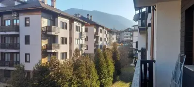 a view from the balcony of an apartment building at Top location ski-in ski-out and Swimming Pool in Bansko
