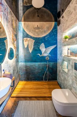 a bathroom with a mural of birds on the wall at Amuse Bouche by Skabrin in Bansko