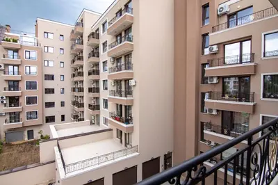 a balcony of an apartment building with balconies at Apartment with private parking 1 in Sofia