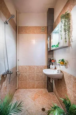 a bathroom with a sink and a shower at National Palace Of Culture 1 Step Away! in Sofia