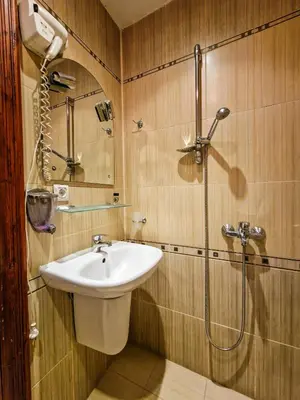 a bathroom with a sink and a shower at 8BD Retreat in Bansko Comfort & Mountain Charm by Flat Mаnager in Bansko