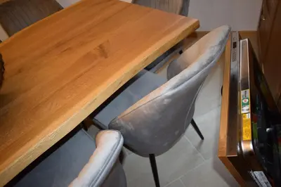 a desk with two chairs and a wooden table at Супер луксозен апартамент в Winslow in Bansko