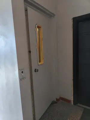 a room with a door with a mirror on it at Newly renovated 2 bedroom apartment in Sofia in Sofia