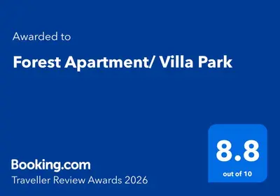 a screenshot of the forest apartment villa park with the text awarded to the forest at Forest Apartment/ Villa Park in Borovets