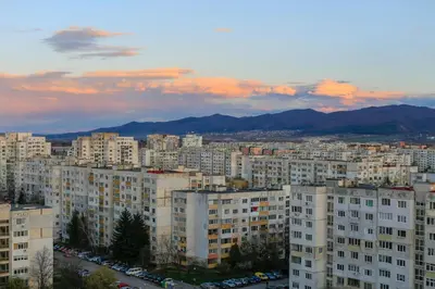 a view of a city with buildings and cars at Cappuccino apartment in Sofia