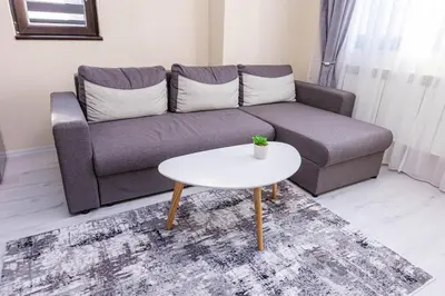a living room with a couch and a table at Apartment Betty in Sandanski