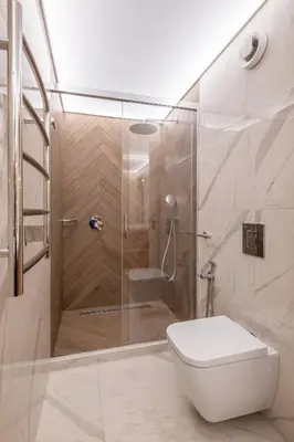 a bathroom with a shower with a toilet and a sink at SOFapart Boutique Apartments in Sofia