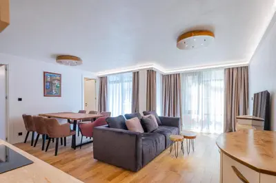 a living room with a couch and a table at SOFapart Boutique Apartments in Sofia