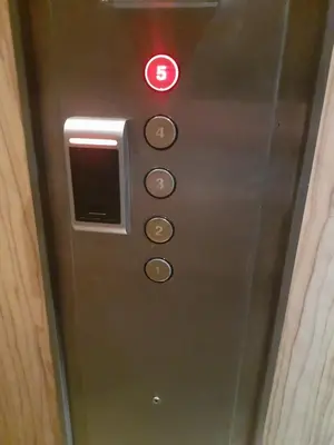 a elevator button with a red sign on it at Apartment Ceco in Troyan