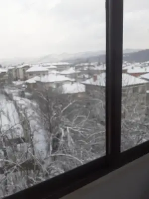 a window with a view of a snow covered field at Apartment Ceco in Troyan