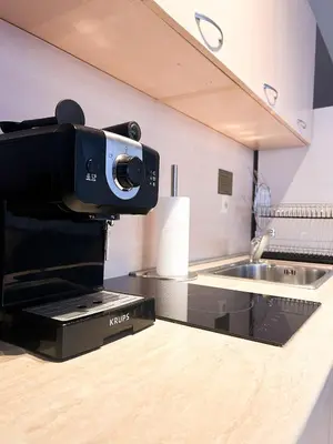 a kitchen with a camera on a counter at Elite Apartments Complex Iglika Borovets in Borovets