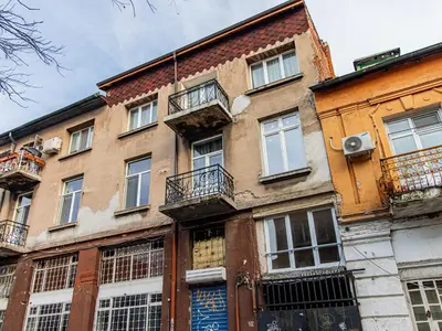 an old building with windows and balconies on it at Eagle's Nest - Sofia Central Studio in Sofia