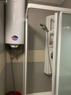 a shower stall in a bathroom with a shower at Apartment 26А Detelina Residence in Bansko