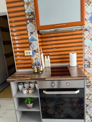 a kitchen with a counter top and a stove at 2 Bedrooms apartment. in Plovdiv