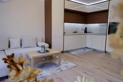 a living room with a couch and a table at View in Petrich