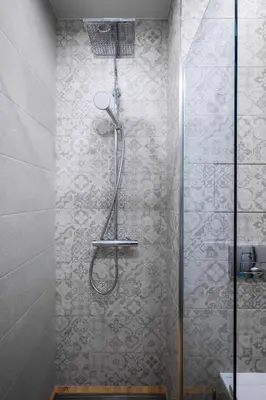 a shower with a shower head in a bathroom at Bright and Cosy 1BD Flat - Perfect for Business Trip by Flat Mаnager in Sofia