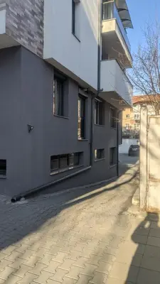 an empty street in front of a building at Central, brand new apart with parking in Blagoevgrad