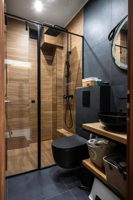 a bathroom with a shower with a toilet and a sink at Lux Flat next to Park with working space by Flat Mаnager in Sofia