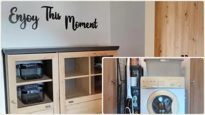 a laundry room with a washer and dryer at apartment Mountain Delight, Bansko in Bansko