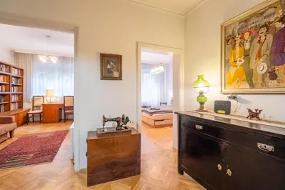 a living room with a dresser and a living room at Opera in Sofia