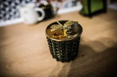 a black container with a bow on top of a table at Green Flat Sofia Historic Center in Sofia