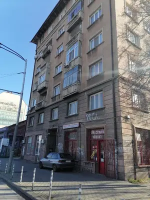 a building with a car parked in front of it at Green Flat Sofia Historic Center in Sofia