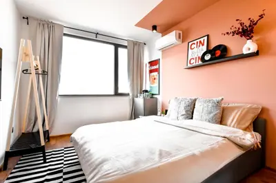 a bedroom with a bed and a window at 4 BDR 2 BTH Netflix Panorama Views in Sofia