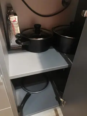 two pots on a shelf in a kitchen at Sunflower in Sofia
