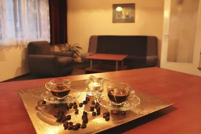 two glasses of tea on a tray on a table at Hotel of Bulgarian Academy of Sciences in Sofia