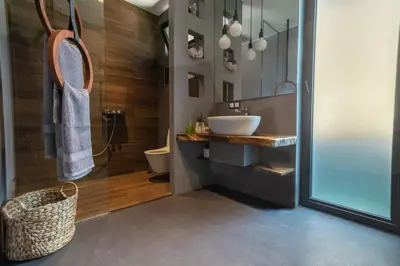 a bathroom with a sink and a toilet at 2 Designer Central Apartments FREE Parking Spaces in Sofia