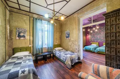 a bedroom with two beds and a window at Guesthouse32 in Sofia