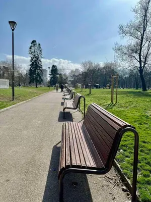 a row of park benches in a park at CENTER Elegant Living in Sofia